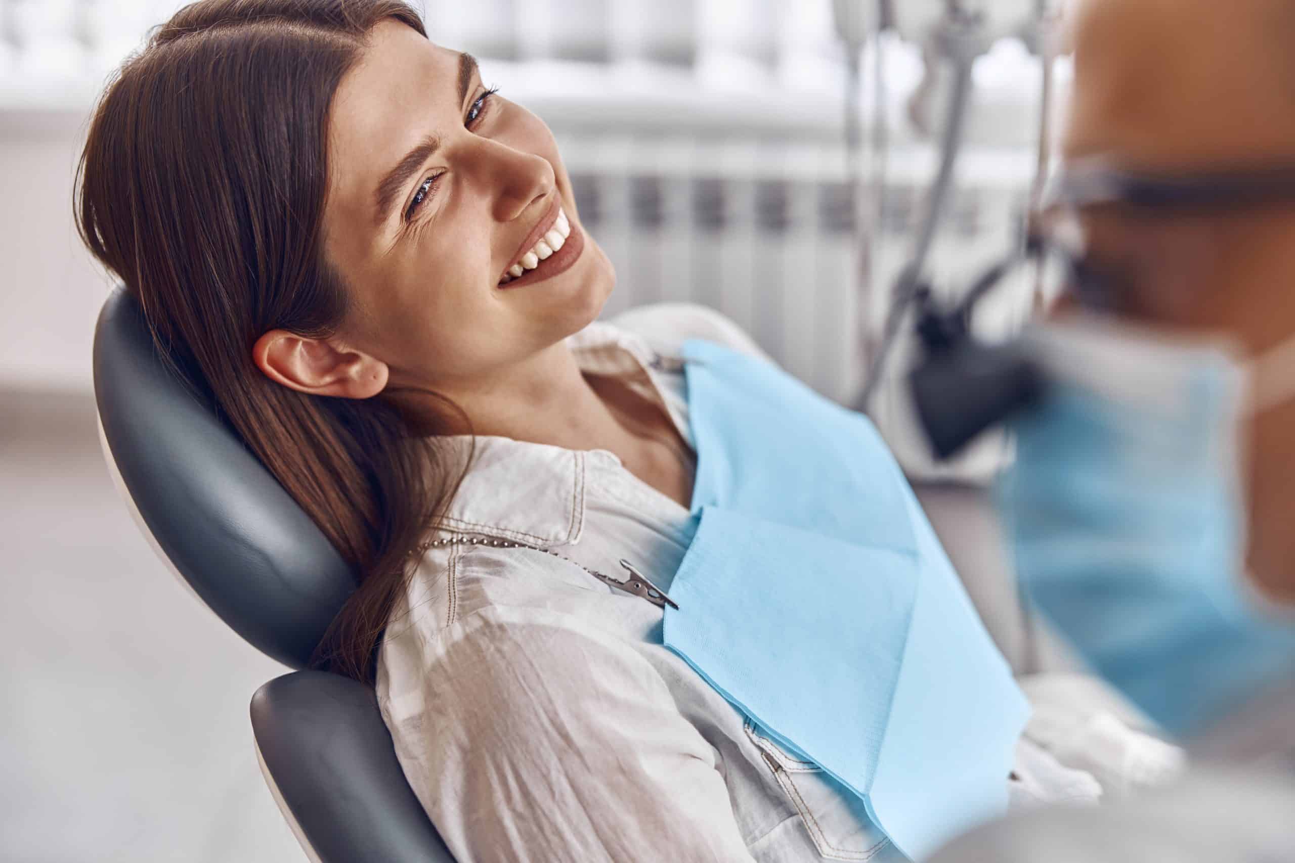 patient smiling in the dental chair