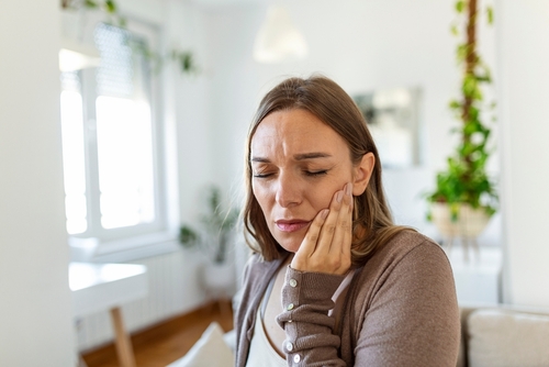 tooth,pain,and,dentistry.,young,woman,suffering,from,terrible,strong