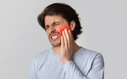 dental,care,and,health,concept.,despaired,man,endure,pain,,empty